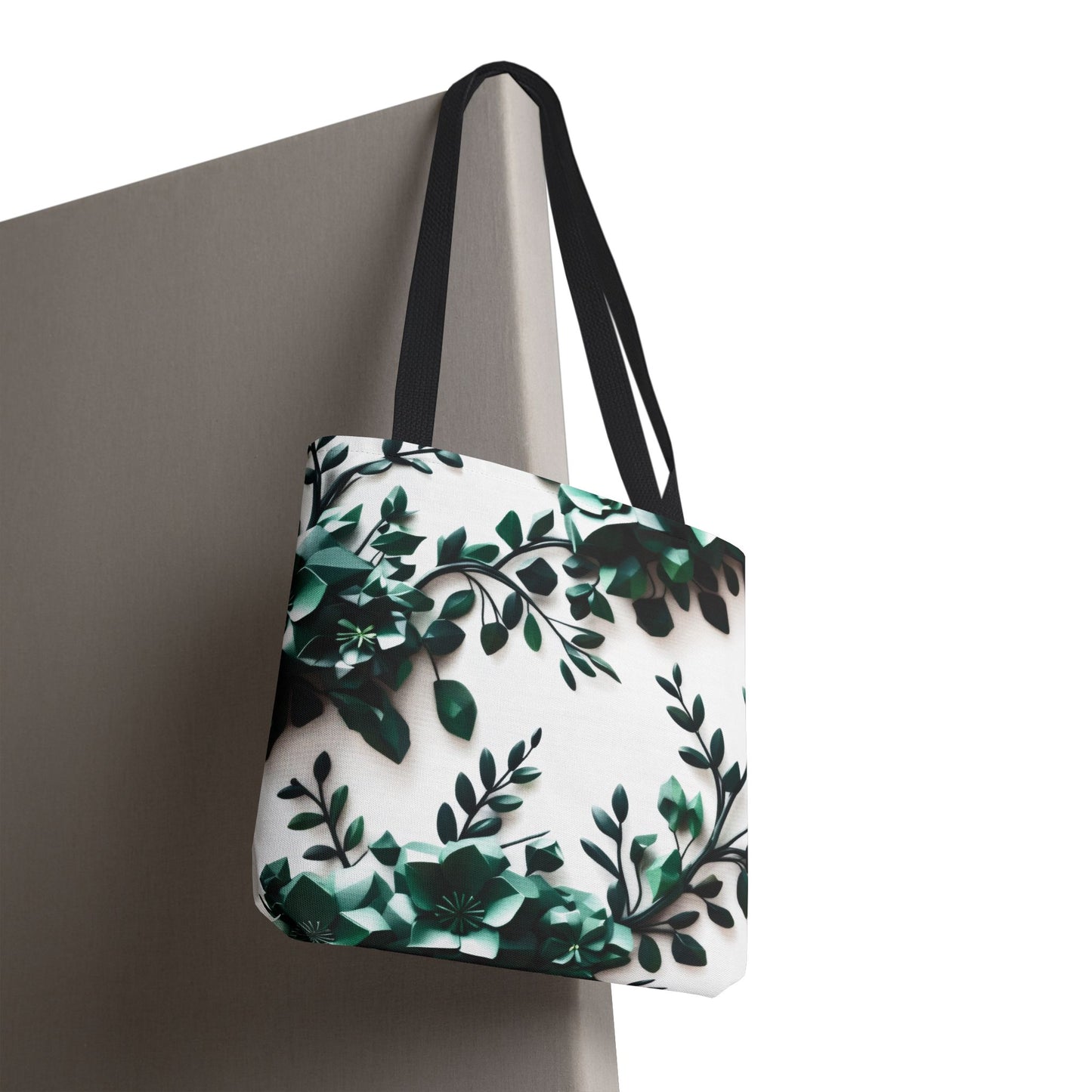 A Reusable and Durable Botanical Bliss Low Poly Design and lightweight Tote Bag, hanged on the door BimBangDesign