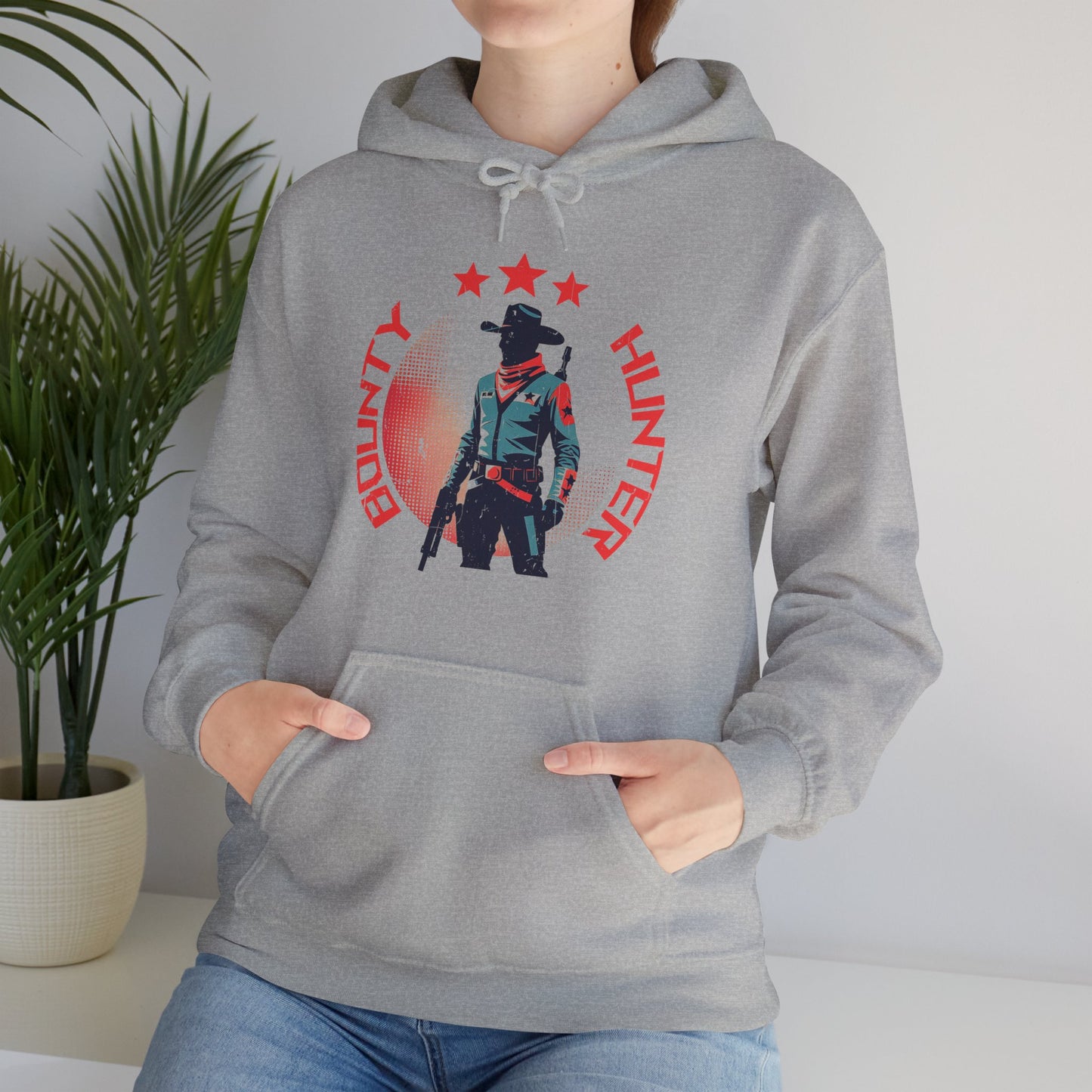 Bounty Hunter Sport Grey Hoodie with minimalist retro space cowboy and stars print worn by quiet sci-fi rebel BimBangDesign