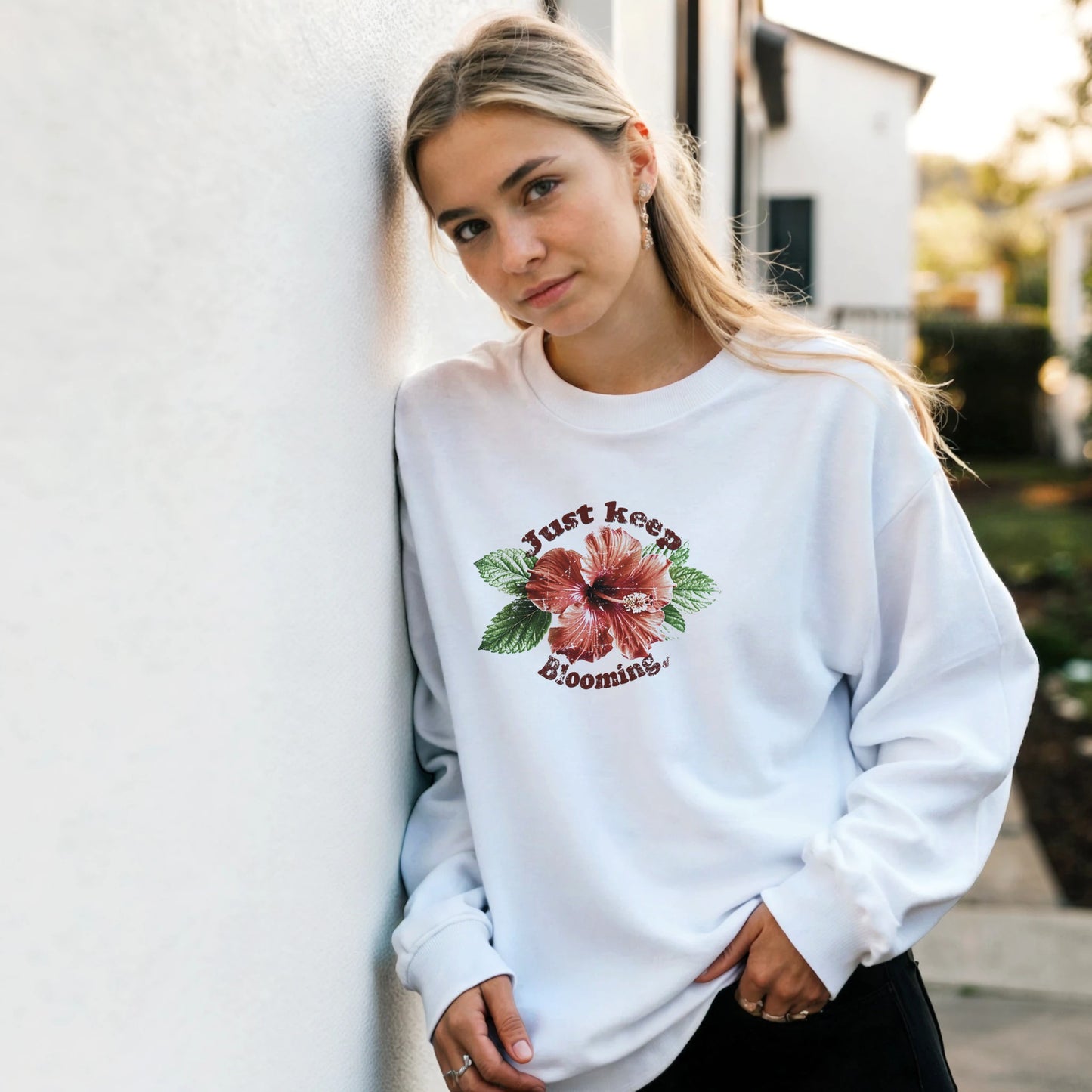 Keep Blooming floral Sweatshirt with soft tones worn by a empowering vibes fan BimBangDesign