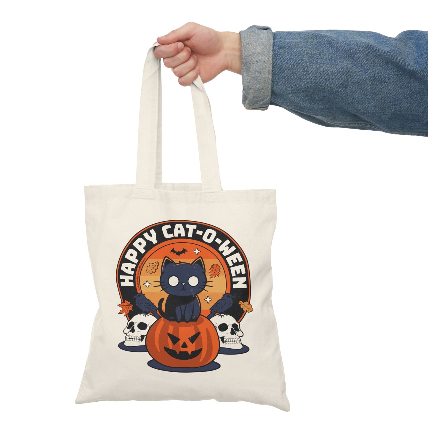Happy Cat-O-Ween tote bag featuring cartoon cat and Halloween design — cute spooky reusable bag held by an halloween fan, BimBangDesign