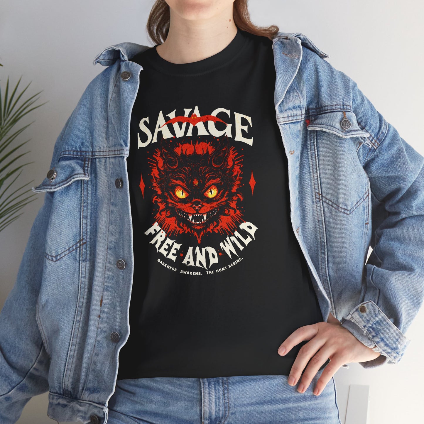 Unisex “Savage – Wild & Free” t-shirt by BimBangDesign — cozy fleece tee with bold wild spirit print, perfect for everyday wear and worn by a feral fan.