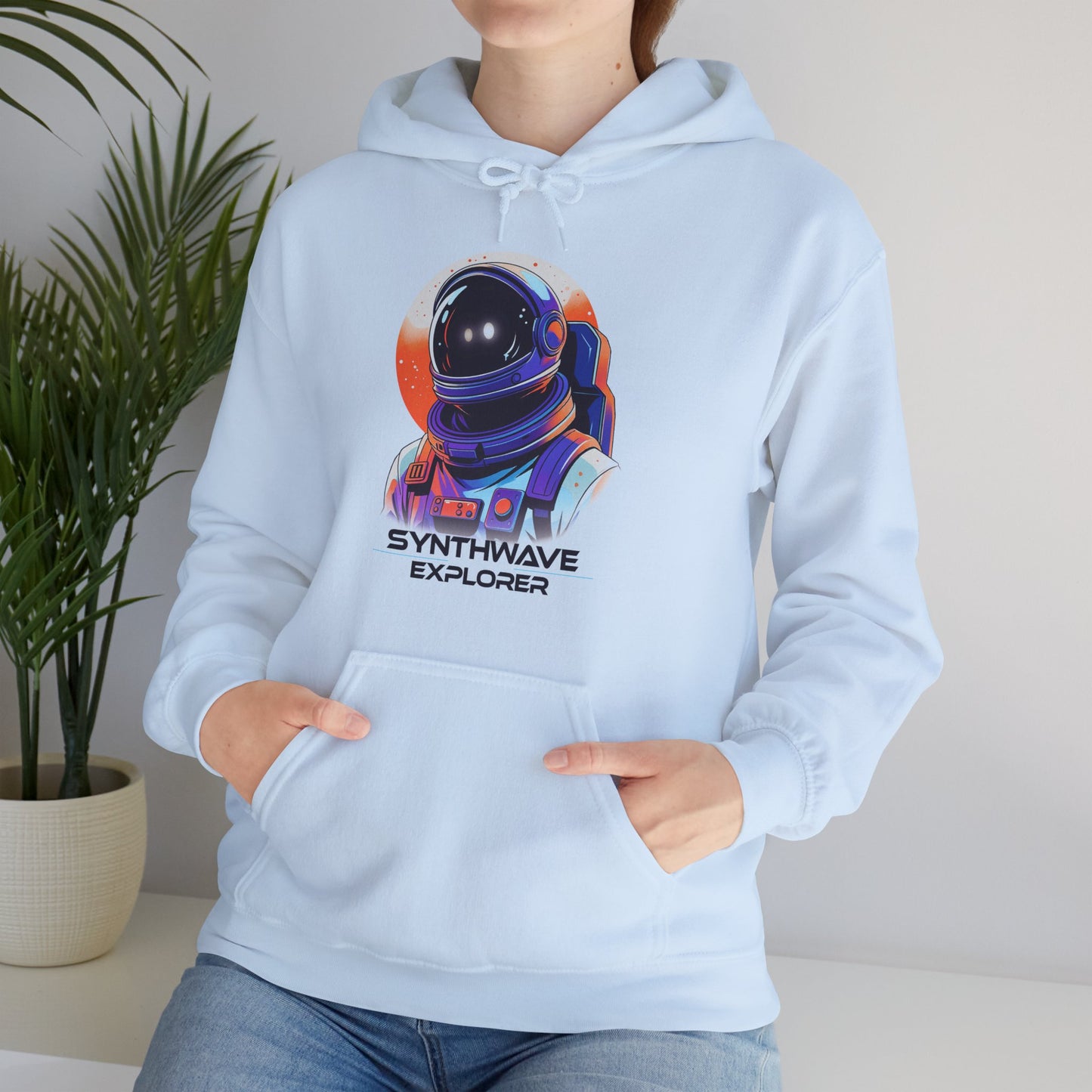 Synthwave Explorer Hoodie with stars, neon sun and retro sci-fi look spaceman  worn by a Futuristic-retro design lover BimBangDesign
