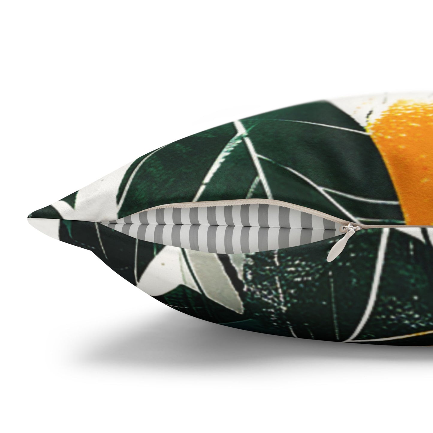 Details of a Decorative Pillowcase of lush tropical green foliage with hand-painted ochre-yellow stylish splashes used as home decor accessory BimBangDesign
