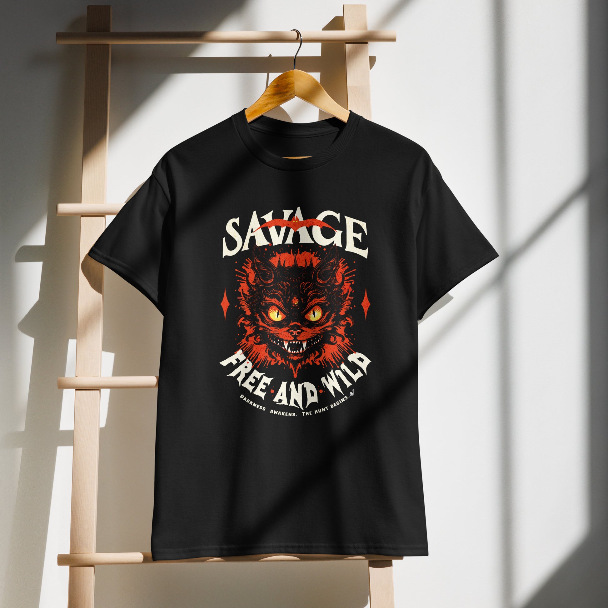 black Unisex “Savage – Wild & Free” t-shirt on demo by BimBangDesign — cozy fleece tee with bold wild spirit print, perfect for everyday wear.