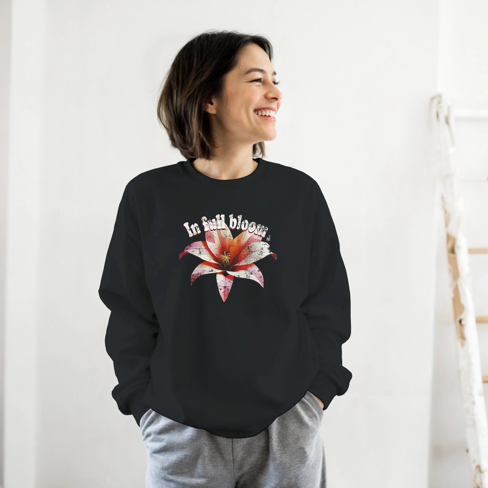 Black In Full Bloom Sweatshirt with minimalist 3d Low poly flower design and pastel tones worn by a botanical themes fan BimBangDesign