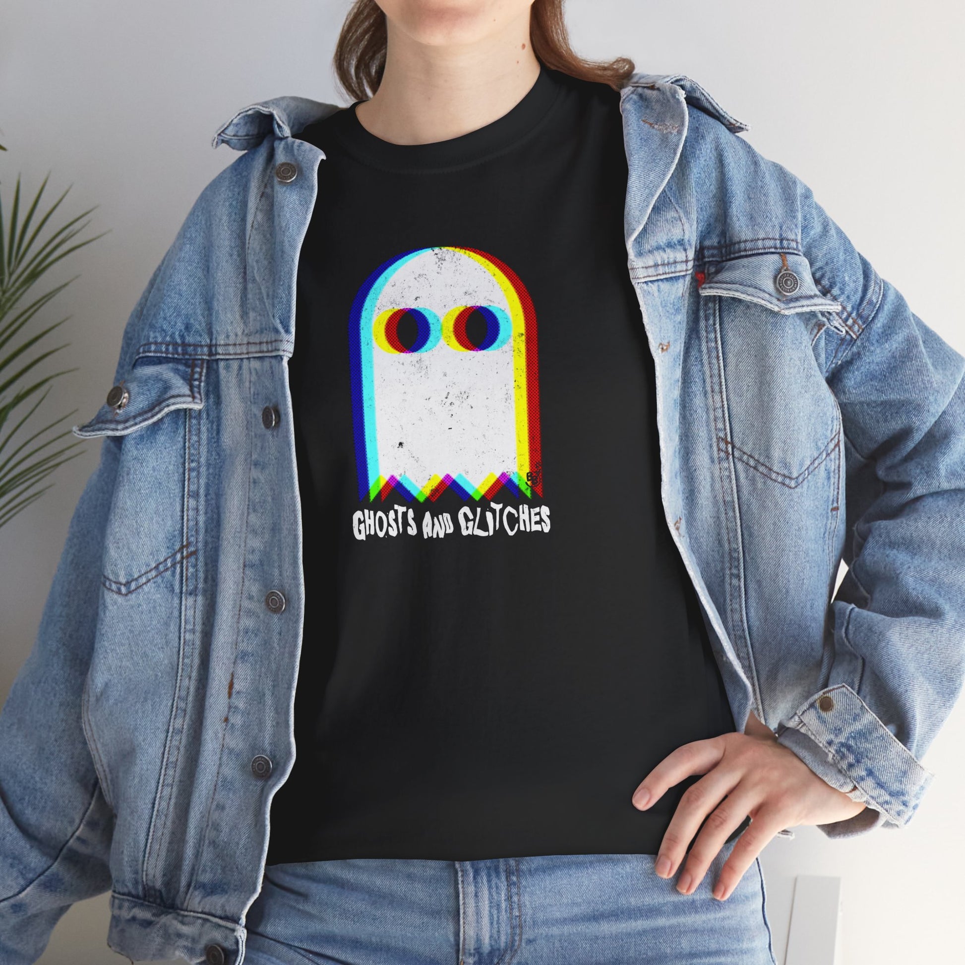 Unisex “Ghosts and Glitches” t-shirt featuring pixel ghosts and retro video game design — worn by an Halloween and video games fan, BimBangDesign