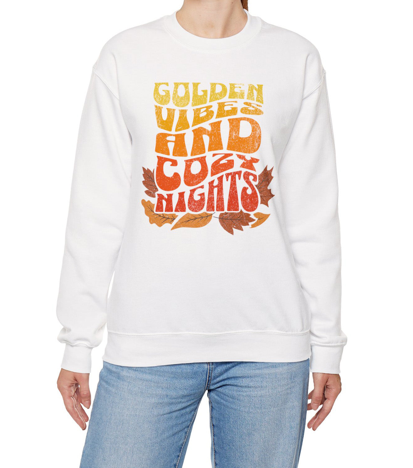 Comfy sweatshirt with “Golden Vibes and Cozy Nights” text in yellow-to-orange gradient and autumn leafs BimBangDesign