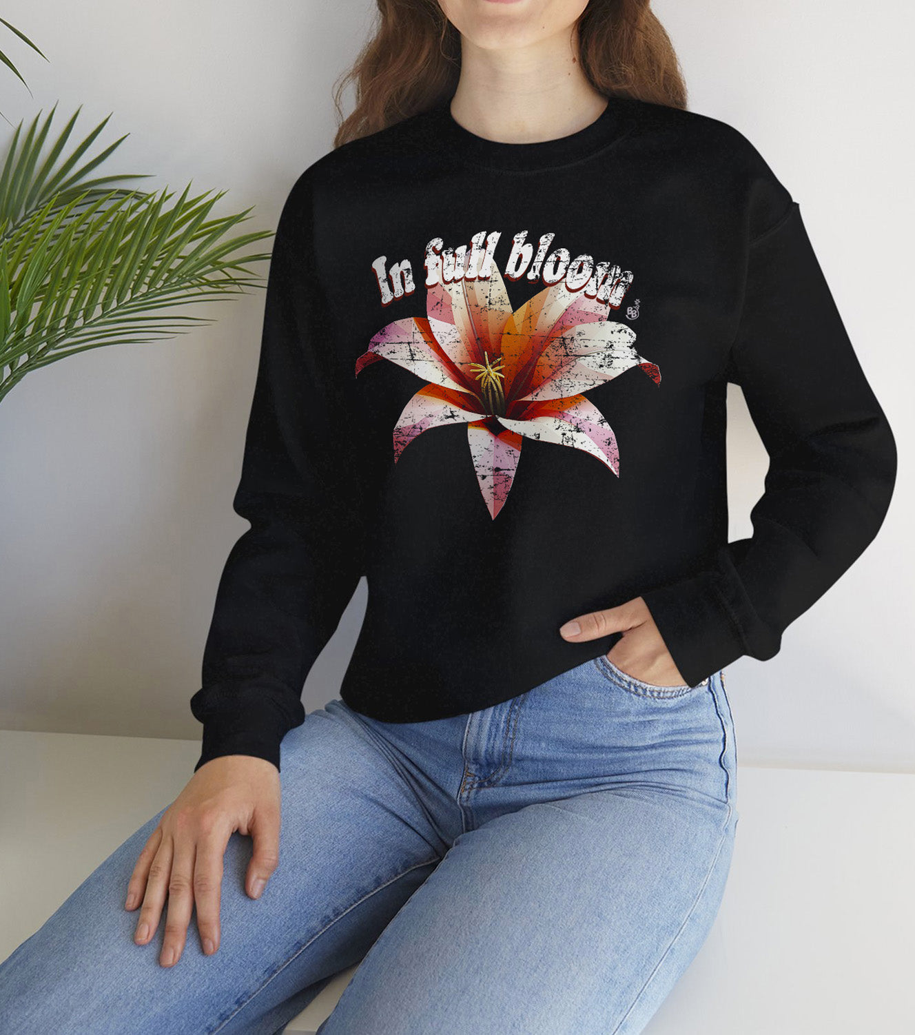 Black In Full Bloom Sweatshirt with minimalist 3d Low poly flower design and pastel tones worn by a positivity floral print lover BimBangDesign