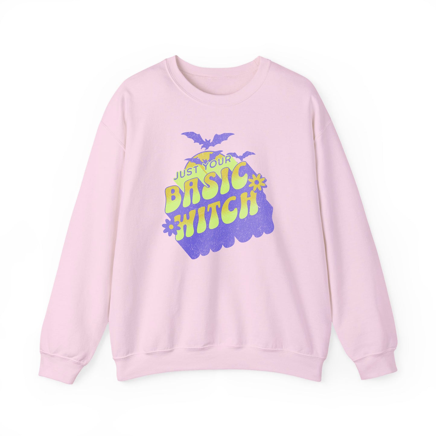 Light Pink Unisex “Just Your Basic Witch” Halloween sweatshirt with witchy print — cozy fall fashion with playful attitude.