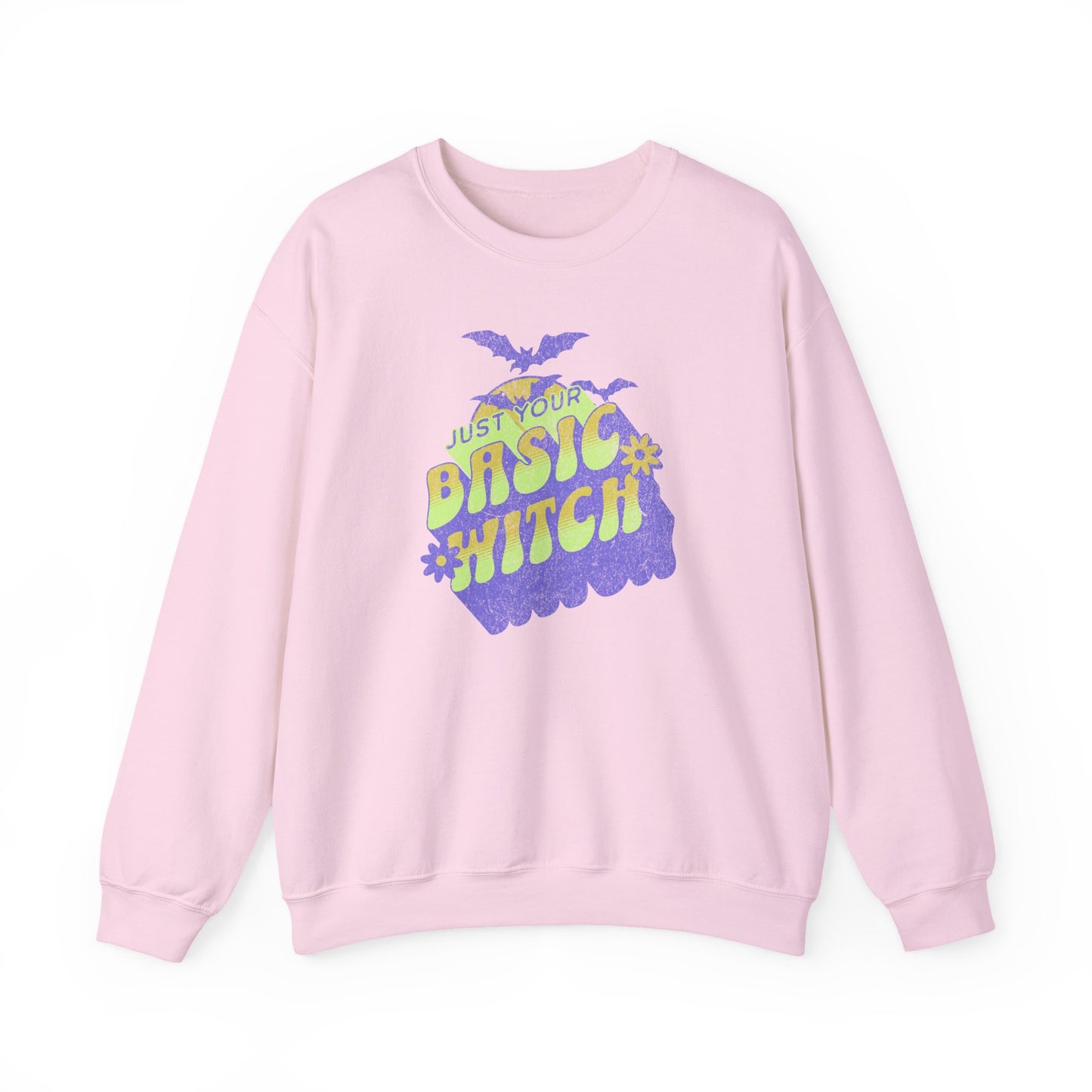 Light Pink Unisex “Just Your Basic Witch” Halloween sweatshirt with witchy print — cozy fall fashion with playful attitude.