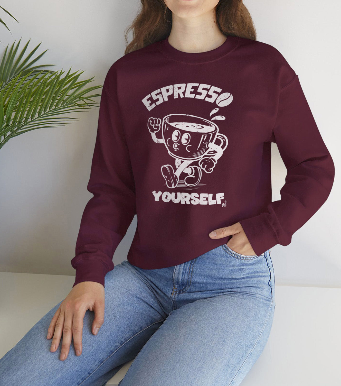 Cartoon Espresso Yourself Maroon Sweatshirt with a coffee cup illustration worn by an espresso coffee lovers BimBangDesign