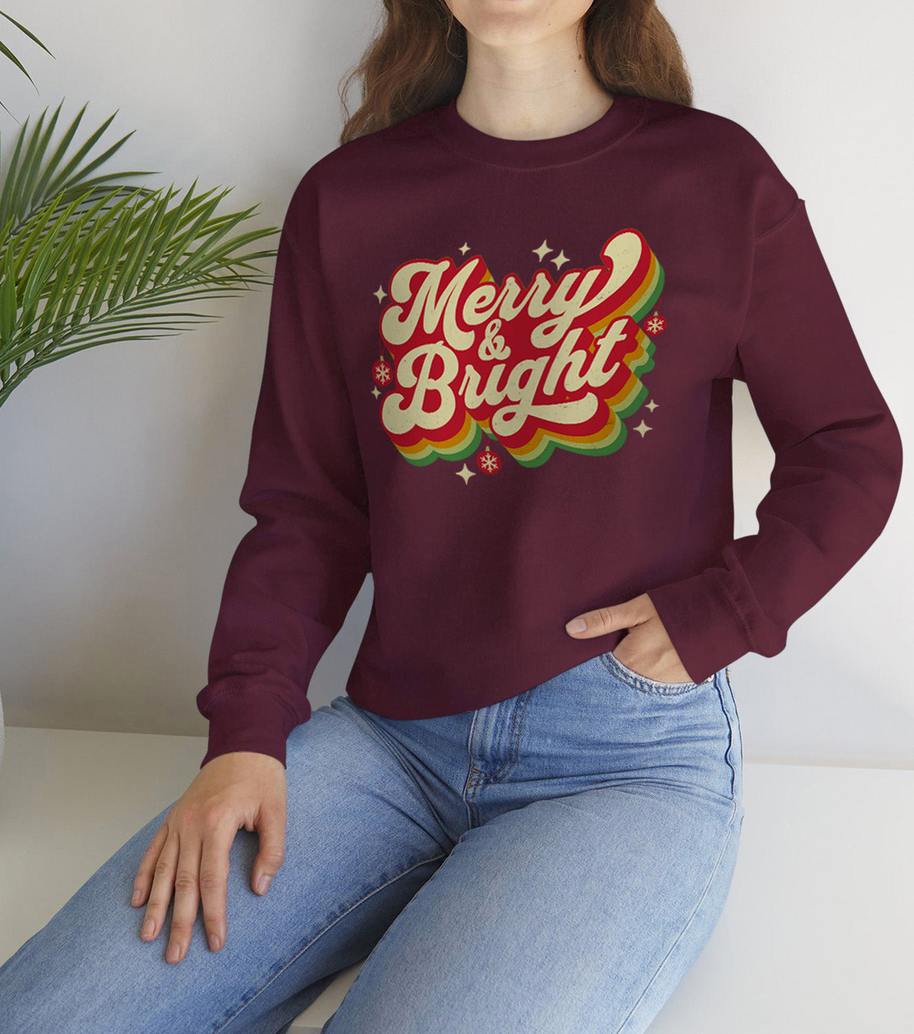 Cozy Unisex Christmas sweatshirt with warm fleece and festive “Merry & Bright” print, worn by a Holiday vibes entousiast BimBangDesign