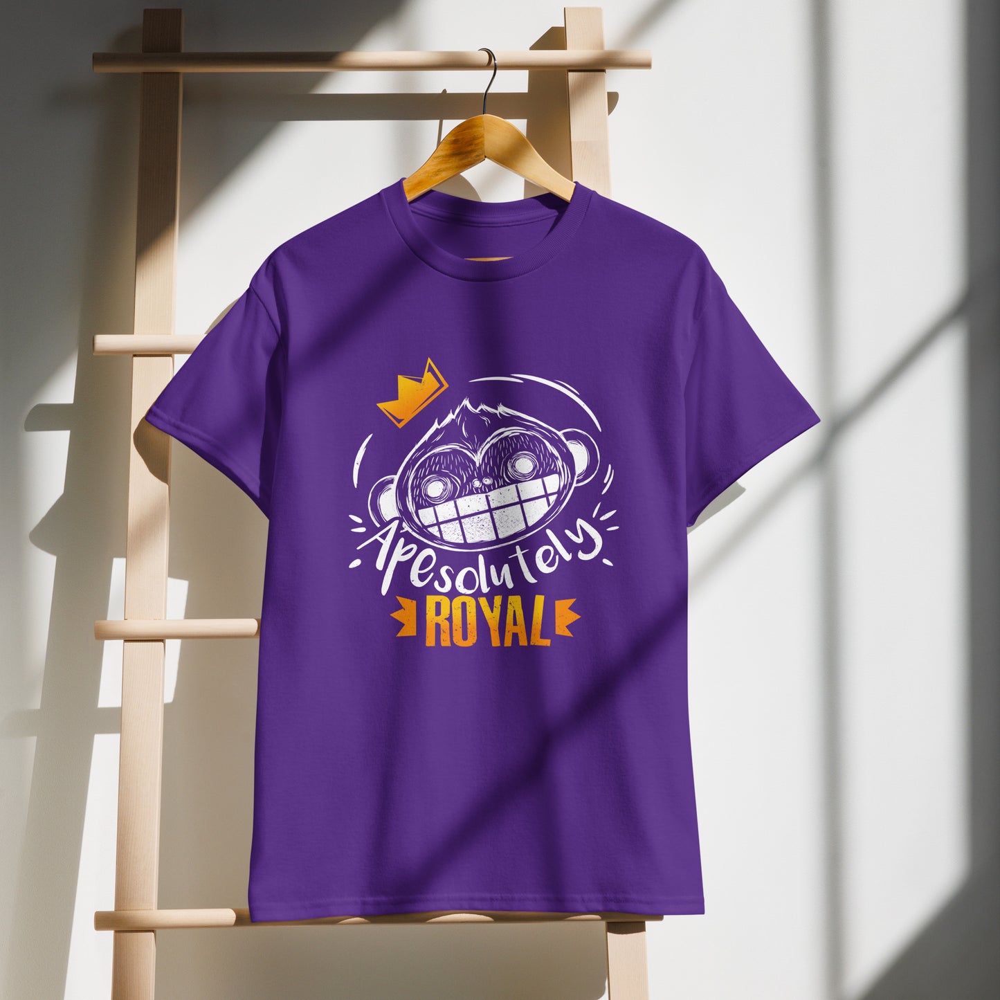 Purple ApeSolutely Royal T-shirt on demo with crowned monkey head, cartoon and sketchy style funny print