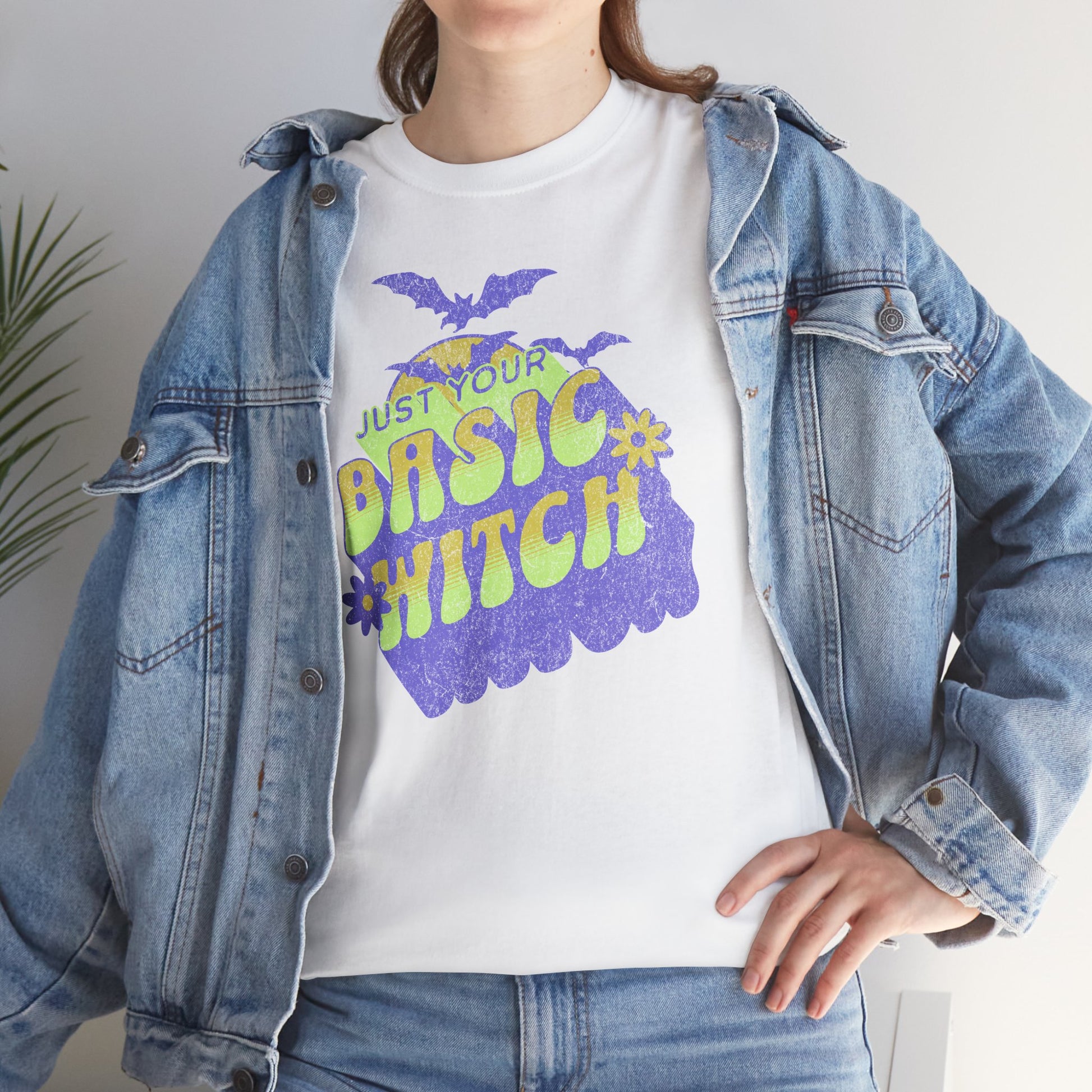 Unisex t-shirt with “Just Your Basic Witch” print – fun Halloween tee featuring retro witchy vibes, perfect for casual spooky style fans. BimBangDesign